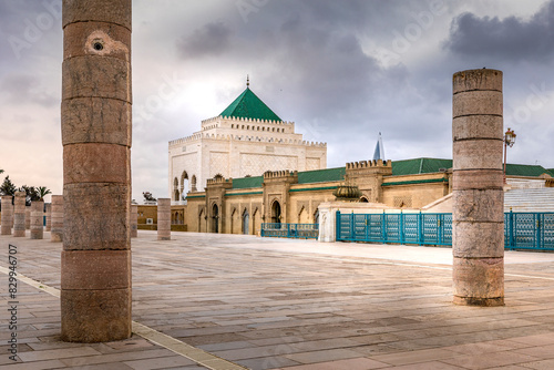Rabat, Morocco - March 22, 2024: The Mausoleum of Mohammed V is a historical building located on the opposite side of the Hassan Tower on the Yacoub al-Mansour esplanade in Rabat, Morocco