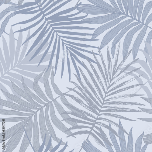 Abstract tropical foliage background in pastel blue colors.