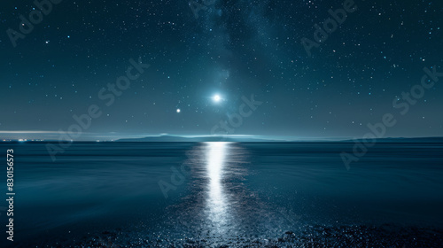 A photographic style of a sky and sea environment, clear night sky with bright stars and a full moon over a serene sea. The moonlight creates a shimmering path on the water's surface. Deep blue tones