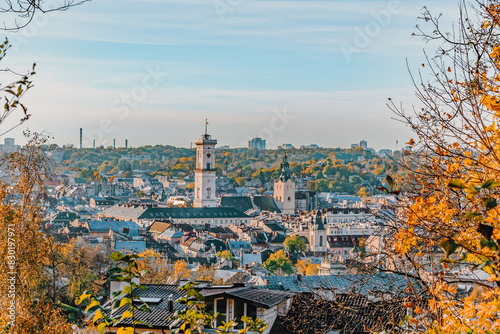 Experience Lviv architectural marvels from above, Ukraine. This panoramic view of the city rooftops with the Lviv Town Hall tower from the Lviv High Castle Mountain is a visual delight