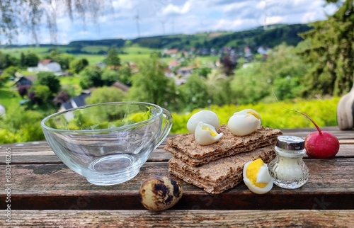 coffee, bread and quail eggs in the pure nature