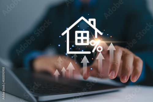 Real estate investment concept. Man touch virtual house icon for analyzing mortgage loan home and insurance real property mortgage. interest rate, Investment planning, business real estate.