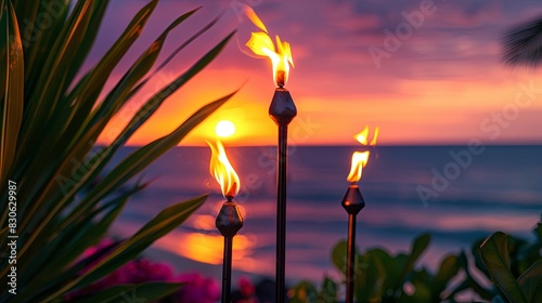 Hawaii sunset with fire torches. Hawaiian icon lights burning at dusk at beach resort or restaurants for outdoor lighting and decoration cozy atmosphere