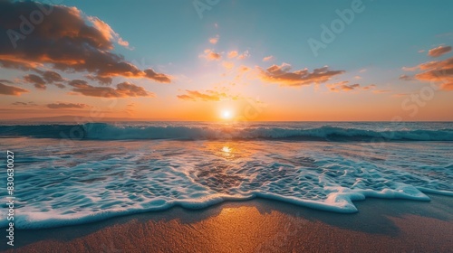 Serene Sunset Scene Over Ocean and Sandy Beach