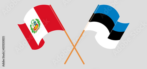Crossed and waving flags of Peru and Estonia