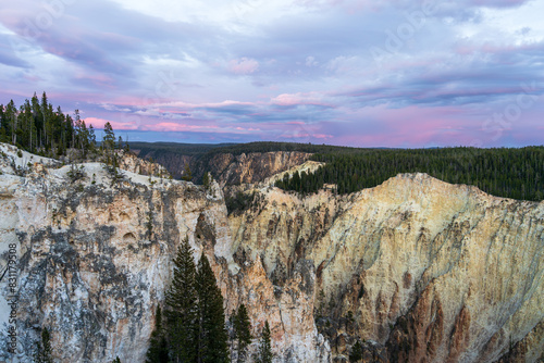 A pink and blue sunset over the Grand Canyon of the Yellowstone in Yellowstone National Park in Wyoming