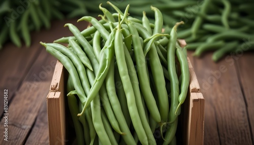 Green beans in a wooden crate, close-up view of the fresh, vibrant green bean pods
