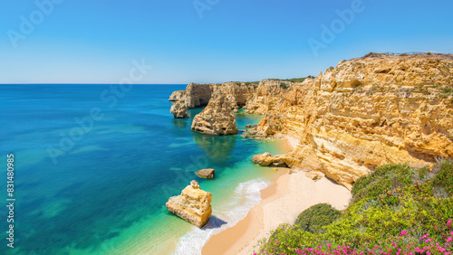 A view of the beach and coastline at Praia da Marinha, Algarve, Portugal.