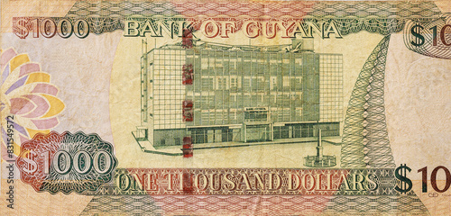 Guyana national currency is bank note in denomination of one thousand Guyanese dollars rear view