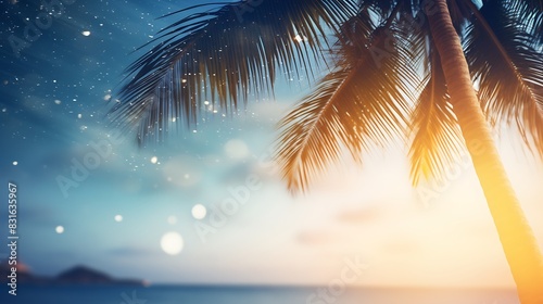 Abstract seascape with palm tree, tropical beach background. blur bokeh light of calm sea and sky. summer vacation background concept 