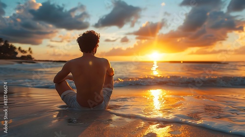 Concept of relaxation and happiness, Man enjoying a sunset at the beach