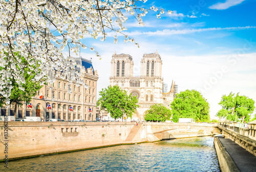 Notre Dame cathedral on Cite island over the Seine river, Paris cityscape at spring, France