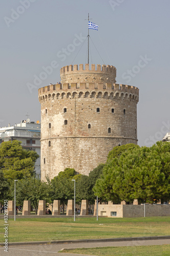 Greek Flag at Top of White Tower of Thessaloniki Historic Landmark