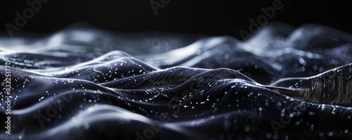 Abstract close-up of wavy dark fabric with reflective highlights, creating a surreal and mysterious texture. Perfect for background or design use.