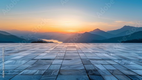 Empty square floor with a mountain landscape background at a sunset sky. Empty concrete tile platform for product display, an outdoor nature scene. A panoramic view of green hills and clouds in summer