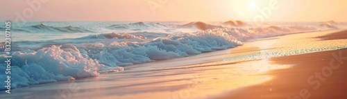 A serene beach at sunset with gentle waves lapping the shore, casting a golden hue over the sand and water.