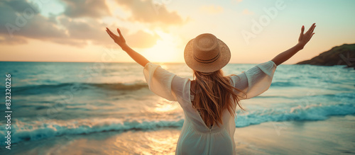 happy woman enjoying with open hands on sea, summer travel concept background