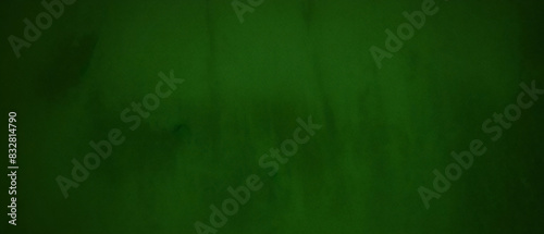 Fond vert foncé ou texture avec peinture en aérosol. fond grunge vert et arrière-plans abstraits de texture de matériau vert foncé.