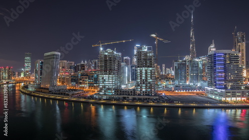 Dubai skyline at night with illuminated skyscrapers