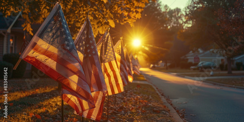 American flags displayed on a sunny neighborhood street during sunset, creating a warm and patriotic atmosphere with vibrant colors and a sense of community pride 