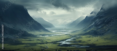 Cloudy day in the valley moody landscape. Creative banner. Copyspace image