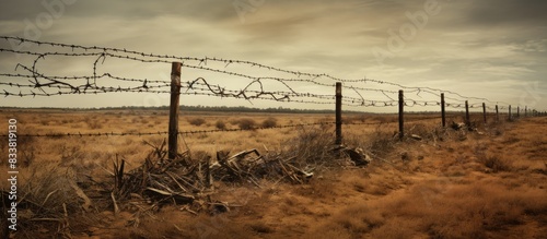 Ancient rustic barbed wire fence with space for adding images. with copy space image. Place for adding text or design