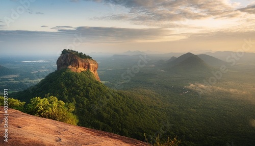 spectacular view of the lion rock surrounded by green rich vegetation picture taken from pidurangala rock in sigiriya sri lanka