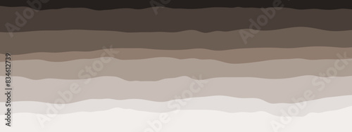 Layered brown soil and rock subsurface. Soil layer cross section