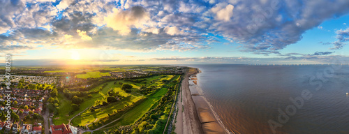Sunset Aerial Panoramic View of the UK Seaside Skegness, a busy tourist town with something for everyone, from stunning campsites to a sunset to die for, showcases the beauty of a serene sunset