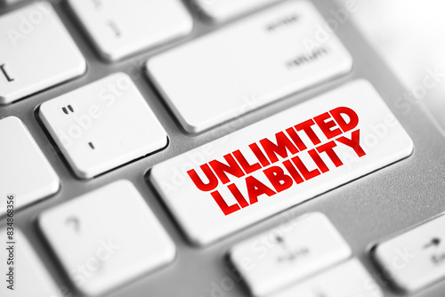 Unlimited Liability is when one or more individuals are liable for their company's taxation and debts, text concept button on keyboard