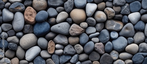 Background made of stones provides a natural and rustic touch to the copy space image.