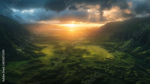 scenic sunset over lush green valley in hawaii with moody sky and verdant landscape