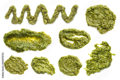 Set of fresh pesto sauce isolated on white, top view