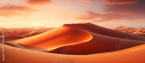 Orange sand dunes in the Sahara Desert at sunset