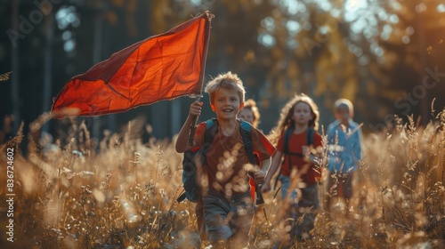 Group of children playing capture the flag At the meadow in the forest