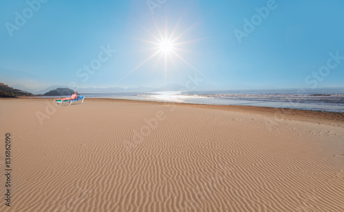 Woman sunbathing on beautiful Sarigerme beach - Sarigerme, Mugla