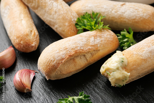 Stone baked ciabatta bread sticks with creamy garlic butter dip.