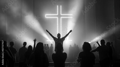 black and white image of people silhouette with raised hands at christian concert worship God and Jesus Christ, black background for overlay. Christian concept