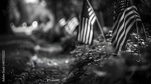 An illustration of the flags in black and white with writing space emphasizing the graveness and enduring reverence for the deceased on Memorial Day