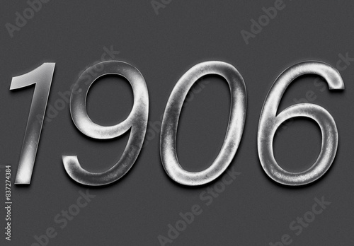 Chrome metal 3D number design of 1906 on grey background.