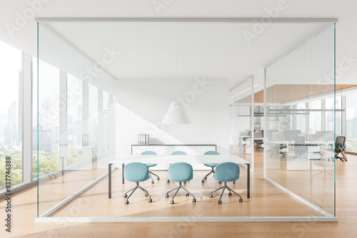 Modern office interior with glass conference room and coworking space, panoramic window