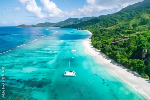 Scenic Aerial View of Grand Anse Beach in Seychelles with Yacht Moored