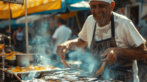 Portuguese man grilling sardines at a street festival