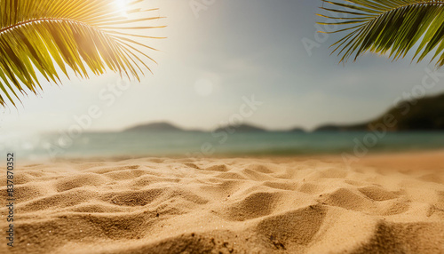 Magical sunny paradise beach with golden sand, palm leaves and sea background. Concept holiday.