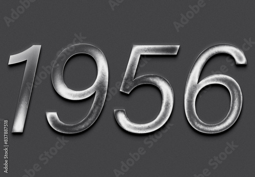 Chrome metal 3D number design of 1956 on grey background.