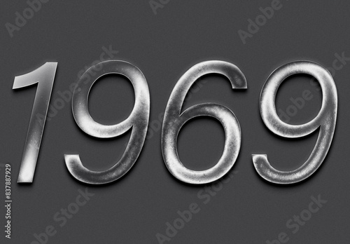 Chrome metal 3D number design of 1969 on grey background.