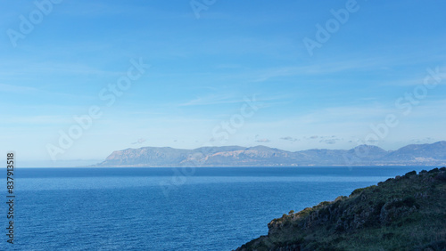 Famous natural reserve Riserva Naturale Orientata dello Zingaro with view over the bay to mountains at the coastline, San Vito Lo Capo, Sicily, Italy