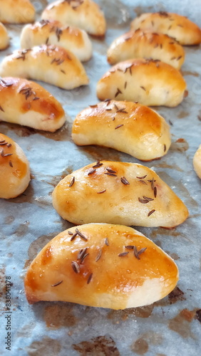 Homemade pies on baking paper