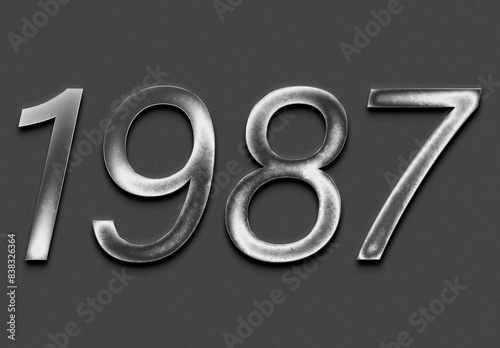 Chrome metal 3D number design of 1987 on grey background.