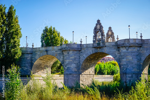 Historic Toledo Bridge, restored baroque-style pedestrian bridge, built between 1719 and 1724, with arches and night lighting